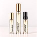 Giardini di Toscana Bianco Latte in three clear-labelled decants: a regular vial, slim rectangular premium 5 ml and round premium 10 ml.